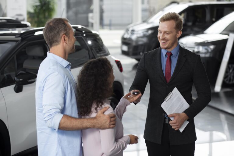 happy-couple-car-showroom-dealership